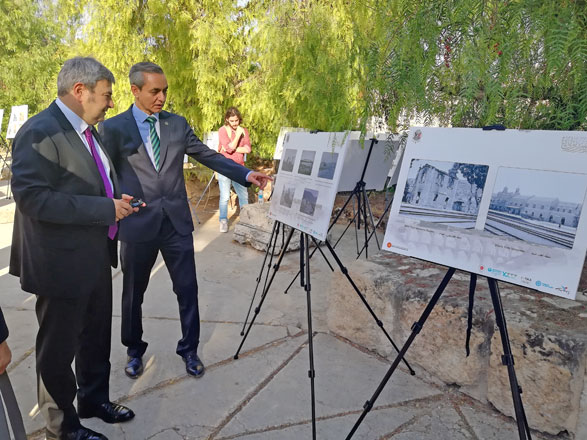  Turkish Ambassador to Jordan Murat Karagöz (left) tours an exhibition on the Hijaz Railway in Amman on Monday (Photo by Bahaa Al Deen Al Nawas)