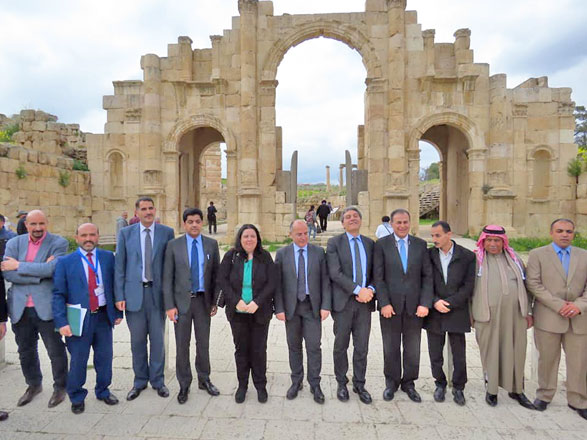 Jordanian and Italian officials pose for a photo after a ceremony to commemorate the launch of the restoration training centre in Jerash on Tuesday (Photo courtesy of Hamzah Otoum)