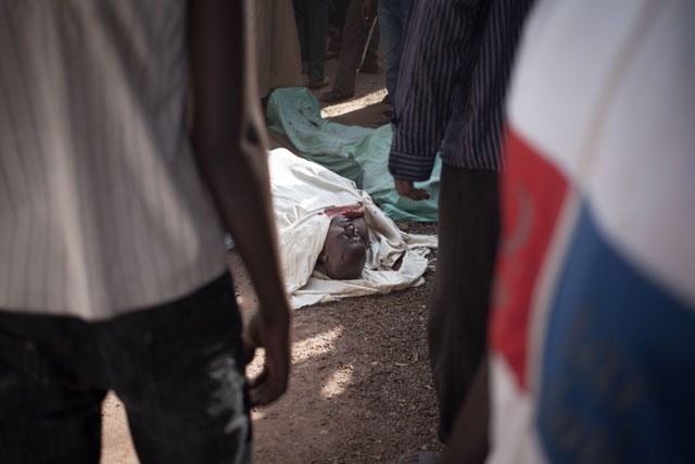 Residents of the mainly Muslim PK5 neighbourhood lay out the bodies of victims of Tuesday’s clashes during a demonstration in front of the headquarters of MINUSCA, the UN peacekeeping mission in the Central Africa Republic, in Bangui, on Wednesday (AFP photo)