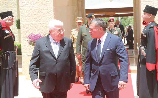 His Majesty King Abdullah receives Iraqi President Fuad Massoum ahead of their meeting at Al Husseiniya Palace on Thursday (Photo courtesy of Royal Court)