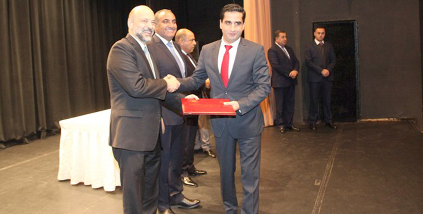 Prime Minister Omar Razzaz hands out the King Abdullah II Award for Youth Innovation and Achievement on Monday (Petra photo)