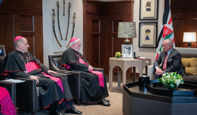 His Majesty King Abdullah on Monday receives Holy See Secretary for Relations with States and International Organisations Archbishop Paul Richard Gallagher at Al Husseiniya Palace (Photo courtesy of Royal Court)