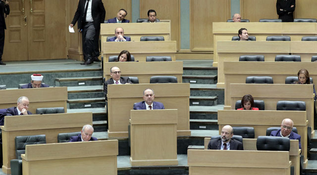 Prime Minister Omar Razzaz and members of the Cabinet attend a Lower House session on Sunday (Petra photo)
