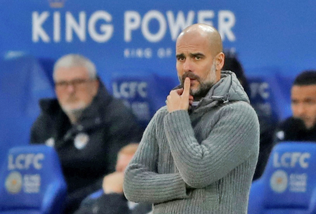 Manchester City manager Pep Guardiola looks on against Leicaster City on Wednesday (Reuters photo)