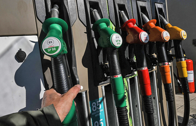 A motorist prepares to fill up his vehicle at a gas station in Montpellier, southern France, on Tuesday, as oil prices are at their highest since 2014 (AFP photo)