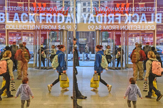 People shop at an H&M store on ‘Black Friday’ in New York City, on Friday (AFP photo)