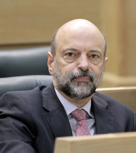 Prime Minister Omar Razzaz attends a session of the Lower House on Wednesday (Photo by Osama Aqarbeh)
