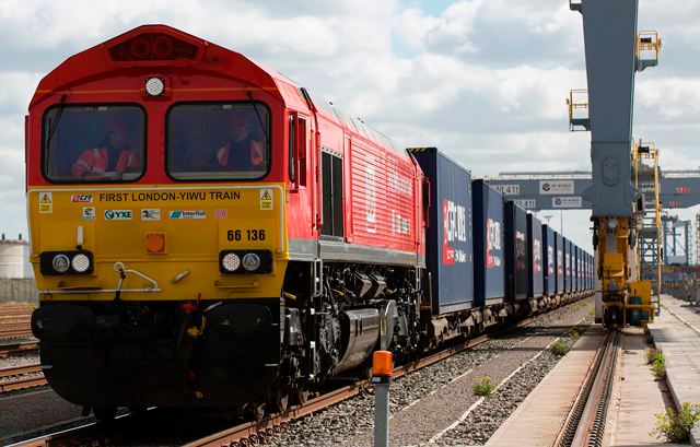A freight train transporting containers laden with goods from the UK, departs from DP World London Gateway's rail freight depot in Corringham, east of London, on Tuesday (AFP photo)