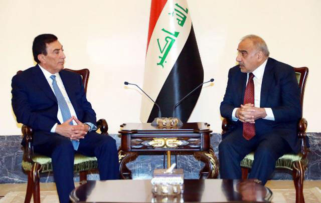 Lower House Speaker Atef Tarawneh meets with Iraqi Prime Minister Adel Abdul Mahdi, on Tuesday as part of a parliamentary visit (Petra photo)