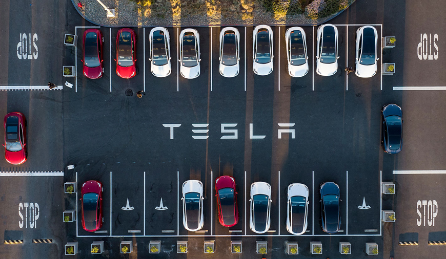 This file photo taken on February 10 shows an aerial view of cars parked at the Tesla Fremont Factory in Fremont, California (AFP photo)