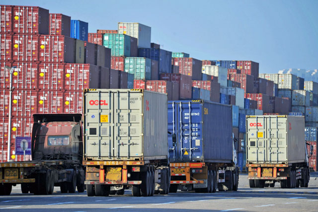 This photo taken on Monday shows containers at the Qingdao Port Foreign Trade Container Terminal in Qingdao, in China's eastern Shandong province (AFP photo)