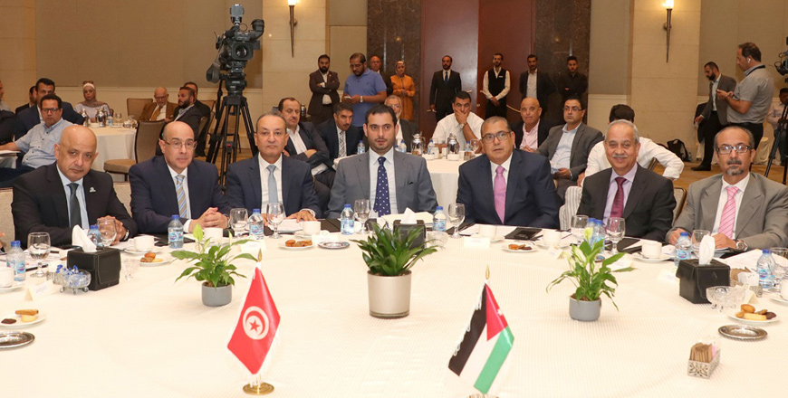  Minister of Industry, Trade and Supply Tareq Hammouri (centre) at a Jordanian-Tunisian Business Council meeting in Amman on Monday  (Petra photo)