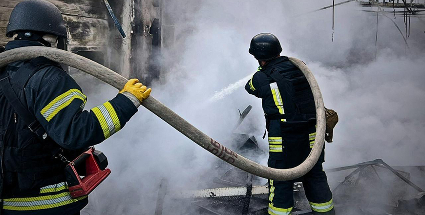 This handout photograph taken and released by Ukrainian State Emergency Service shows on May 18, 2025, shows rescuers dousing a fire in a building following drone attacks on the Kyiv region, amid Russian invasion in Ukraine (AFP photo)