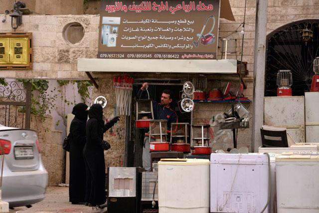 Women buy a kerosene heater from a shop in downtown Amman in this undated photo (JT file photo)