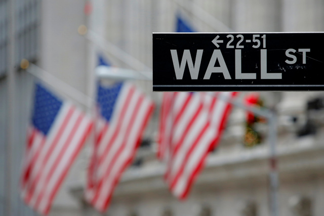 A street sign for Wall Street is seen outside the New York Stock Exchange in Manhattan, New York City, US, on December 28, 2016  (Reuters file photo)
