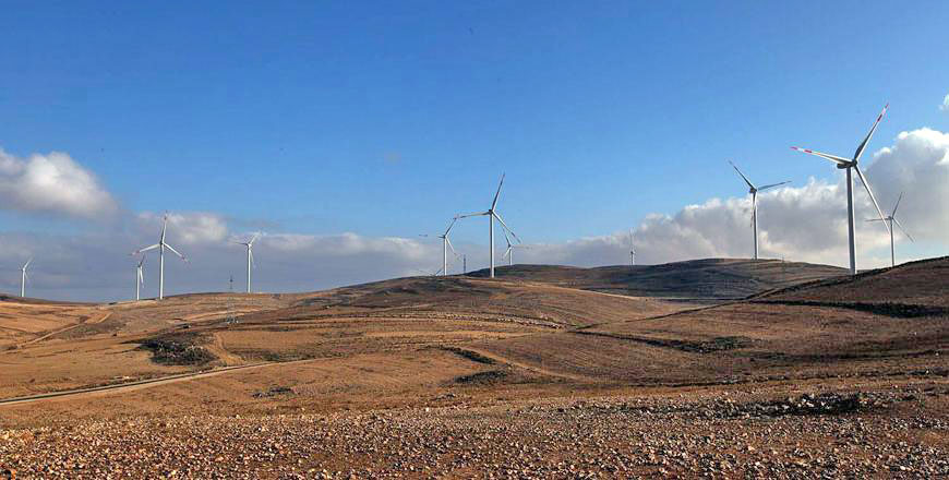 Wind turbines can be seen at the Tafileh Wind Farm, some 180km southwest of Amman, in this undated photo. The Ministry of Energy and Mineral Resources announced a decision on Tuesday to freeze new renewable energy projects pending studies and a national plan (JT file photo)