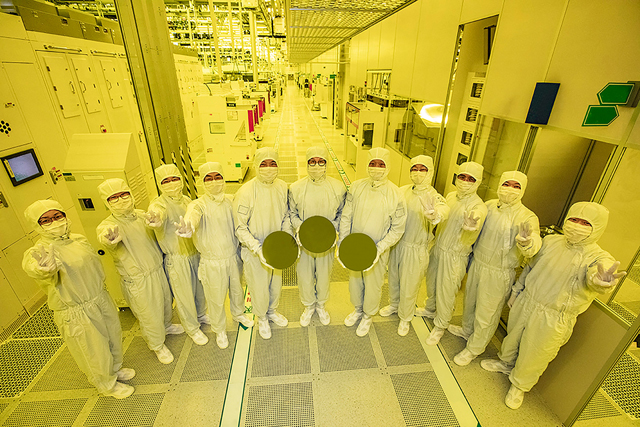 This undated handout photo provided by Samsung Electronics on Thursday shows leaders of Samsung Foundry Business and Semiconductor R&D Centre posing to celebrate the company’s first production of 3-nanometer process chips at its semiconductor facility of Samsung Electronics Hwaseong Campus in Hwaseong (AFP photo)