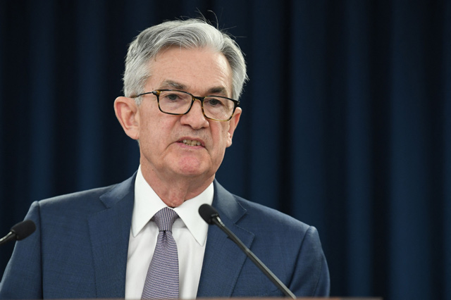 US inflation will remain 'elevated' in coming months but will decline once supply bottlenecks and other temporary issues are resolved, Federal Reserve Chair Powell said on Wednesday (AFP photo)
