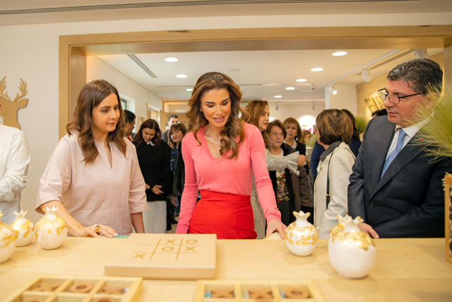 Her Majesty Queen Rania tours the 23rd annual Jordan River Designs handicrafts exhibition on Tuesday (Photo courtesy of Royal Court)