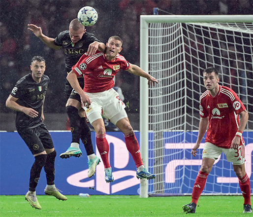 Union Berlin’s German forward #17 Kevin Behrens attempts to score during the UEFA Champions League group C football match 1 FC Union Berlin v SSC Napoli at the Olympic Stadium in Berlin on Tuesday (AFP photo)