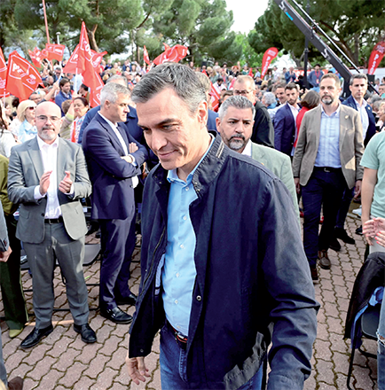 Spain’s Prime Minister Pedro Sanchez (centre) arrives to an electoral meeting of Spain’s Socialist Party in Madrid on Thursday ahead of the Sunday regional and municipal election (AFP photo)
