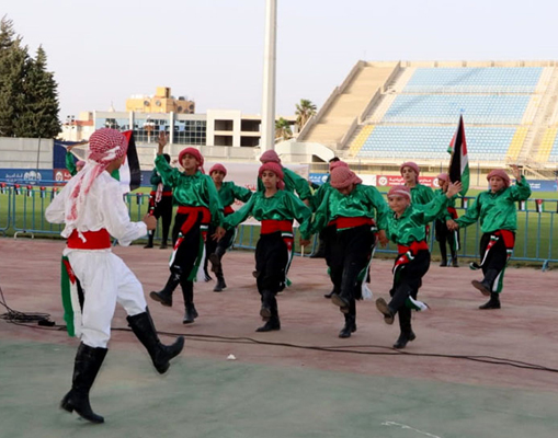 Children perform during a carnival in Irbid on Saturday ahead of the proclamation of the northern governorate as the Capital of Arab Culture on Sunday (Petra photo)