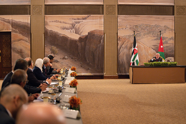 His Majesty King Abdullah during a meeting with the president and members of the National Centre for Human Rights’ board of trustees and the Jordan Press Association president Al Husseiniya Palace on Tuesday (Photo courtesy of Royal Court) 