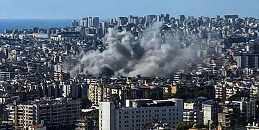 Thick smoke rises above the southern suburbs of Beirut after an Israel strike on September 20, 2024 (AFP photo)