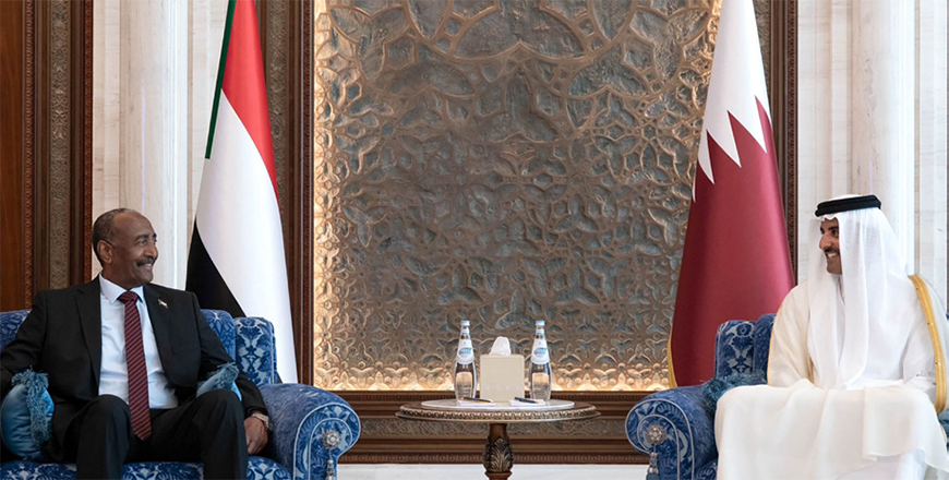 This handout photo released by Qatar's Amiri Diwan shows Qatar's Emir Sheikh Tamim Bin Hamad Al Thani meeting with Sudan's army chief General Abdel Fattah Al Burhan in Doha on Thursday (AFP photo)