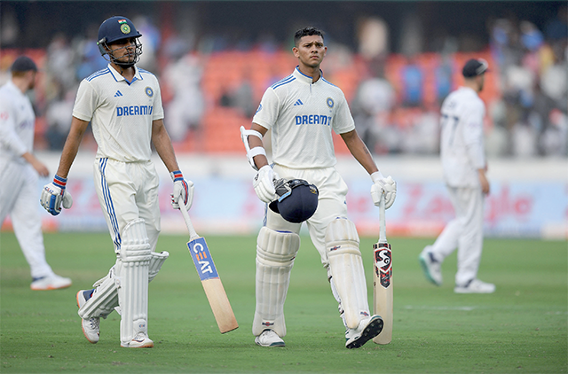 India’s Shubman Gill (left) and Yashasvi Jaiswal walks back to the pavilion at the end of the first day of the first Test cricket match between India and England at the Rajiv Gandhi International Stadium in Hyderabad on Thursday (AFP photo)