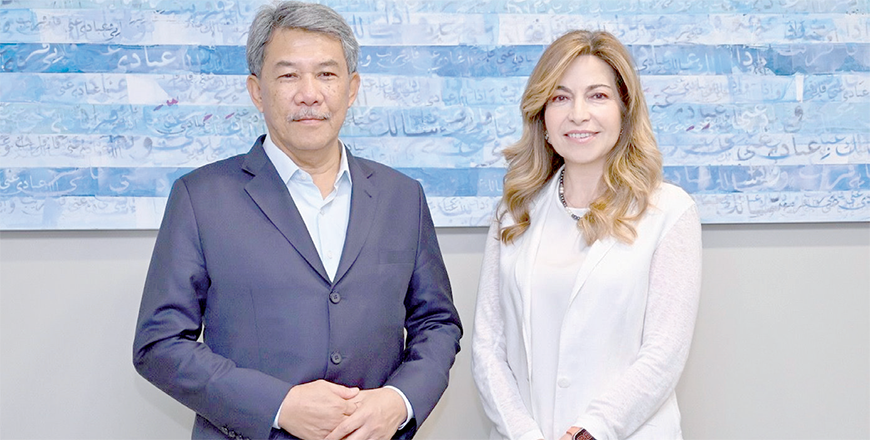 Princess Ghida and Hasan go over means to enhance cooperation to support the foundation’s efforts through Malaysia’s contribution to cover costs of treating cancer patients from Gaza (Petra photo)