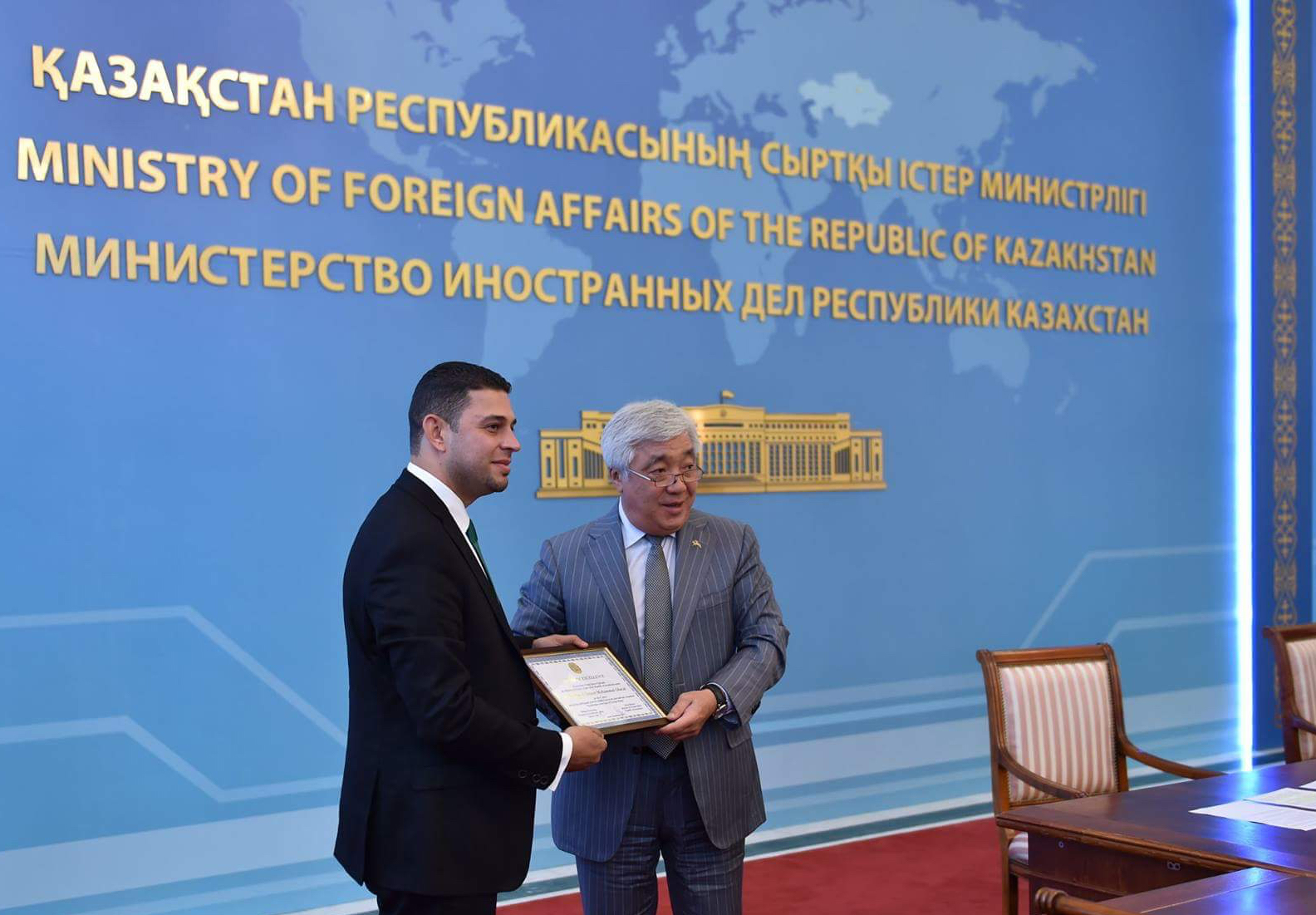Mohammad Ghazal receives an award from Kazakh Foreign Minister Erlan Idrissov in Astana on Tuesday (Photo courtesy of Kazakh foreign ministry)