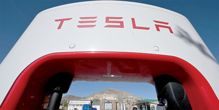 A Tesla charger frames the site of the Tonopah Historic Mining Park, in the mining town of Tonopah, Nevada on May 8, 2024 (AFP photo)