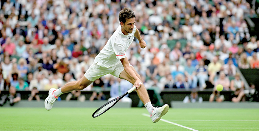 Czech Republic’s Vit Kopriva returns the ball to Serbia’s Novak Djokovic during their men’s singles tennis match on the second day of the 2024 Wimbledon Championships at The All England Lawn Tennis and Croquet Club in Wimbledon, southwest London, on Tuesday (AFP photo)
