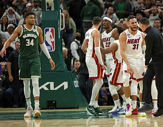 Max Strus #31 and members of the Miami Heat celebrate in front of Giannis Antetokounmpo #34 of the Milwaukee Bucks after winning Game 5 of the Eastern Conference First Round Play-offs in overtime at Fiserv Forum on Wednesday in Milwaukee, Wisconsin (AFP photo)