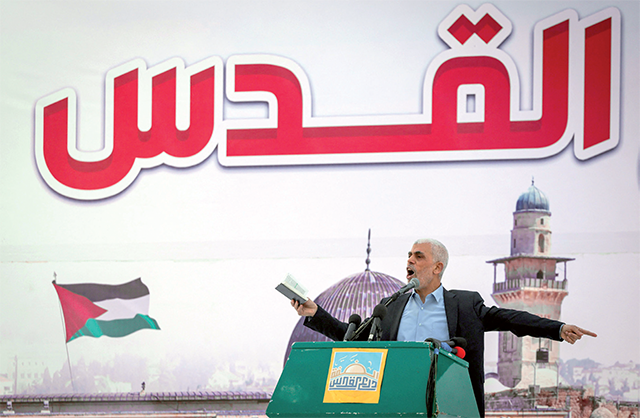 Yahia Al-Sinwar (C), the Gaza Strip chief of the Palestinian Islamist Hamas movement, addresses supporters during a rally marking Al-Quds Day, a commemoration in support of the Palestinian people celebrated annually on the last Friday of the Muslim fasting month of Ramadan, in Gaza City, on April 14 (AFP photo)