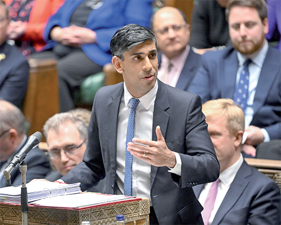 A handout photograph released by the UK Parliament shows Britain’s Prime Minister Rishi Sunak speaking during the Prime Ministers’ Questions (PMQs) in the House of Commons, in London, on Wednesday (AFP photo)