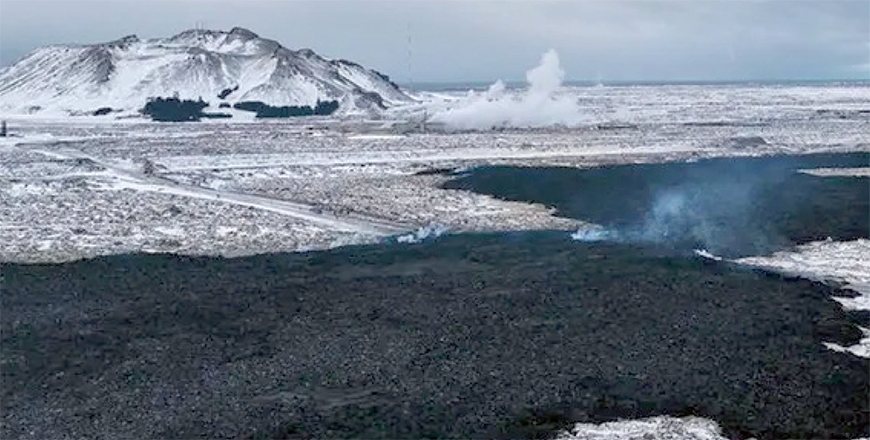 This aerial view taken on February 9 near the Blue Lagoon geothermal spa and retreat hotel in Grindavik, Iceland shows a lava field covering a road to the Blue Lagoon (AFP photo)