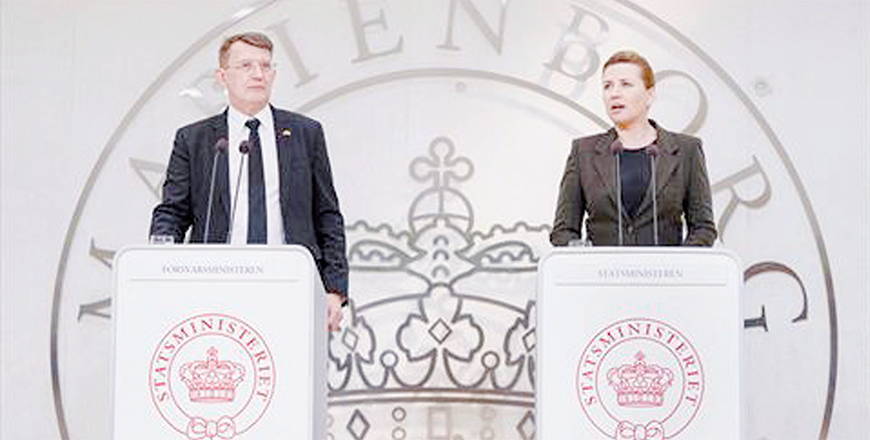 Danish Prime Minister Mette Frederiksen and Danish Defence Minister Troels Lund Poulsen attend a press conference in Copenhagen, Thursday (AFP photo)