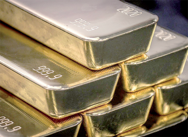 Gold bullion bars are pictured after being inspected and polished at the ABC Refinery in Sydney on August 5, 2020 (AFP file photo)