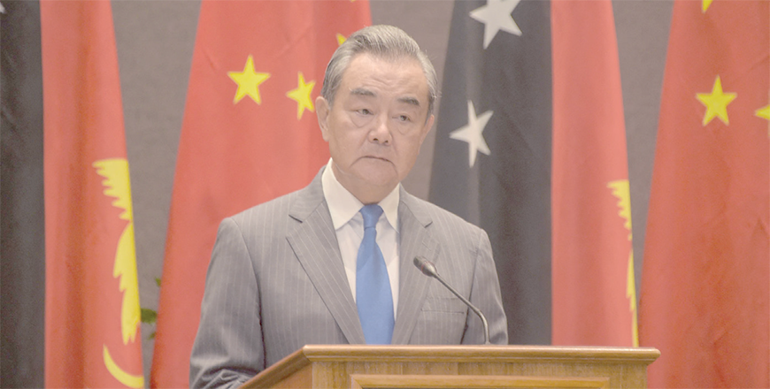 China’s Foreign Minister Wang Yi speaks during a press conference with Papua New Guinea’s Foreign Minister Justin Tkatchenko in Port Moresby on Saturday (AFP photo)