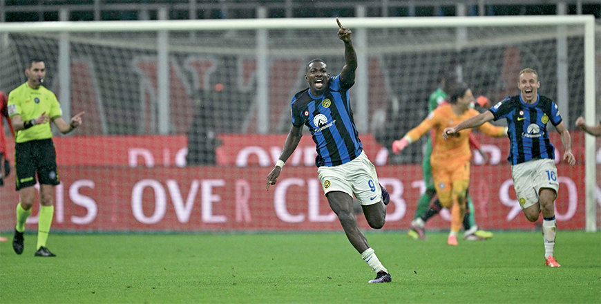 Inter Milan’s French forward #09 Marcus Thuram (centre) celebrates winning the 2024 Scudetto championship title on Monday (AFP photo)