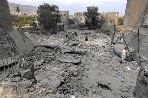 A man stands amidst the rubble of a collapsed building at the site of a reported US air strike on Yemen's Huthi-held capital Sanaa on March 24, 2025 (AFP photo)