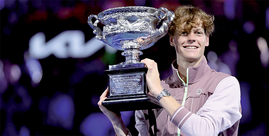Italy’s Jannik Sinner celebrates with the Norman Brookes Challenge Cup trophy after defeating Russia’s Daniil Medvedev in the men’s singles final match on day 15 of the Australian Open tennis tournament in Melbourne on Sunday (AFP photo)