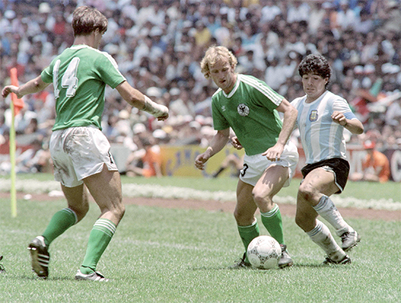Argentina’s Diego Maradona (right) fights for the ball with German Andreas Brehme (centre) and his teammate Thomas Berthold during the final match of the 1986 Football World Cup Federal Republic of Germany vs Argentina on June 29, 1986 at Mexico City (AFP photo)