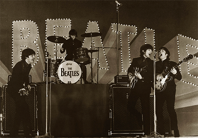 This photo taken on June 30, 1966 shows British band The Beatles, (left to right) Paul McCartney, Ringo Starr, George Harrison and John Lennon, performing during their concert at the Budokan in Tokyo (AFP photo)