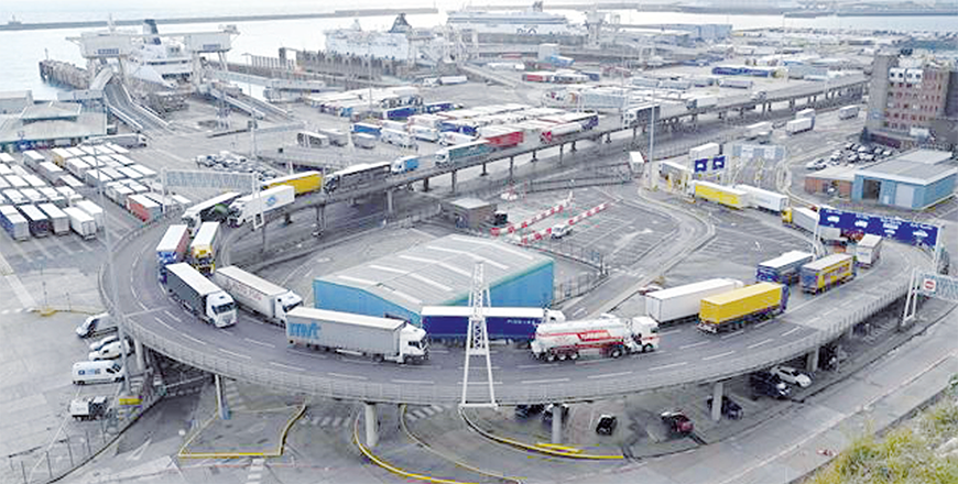 In this file photo taken on December 10, 2020, freight lorries are seen queuing to leave after arriving by ferry at the port of Dover on the south coast of England  (AFP file photo)
