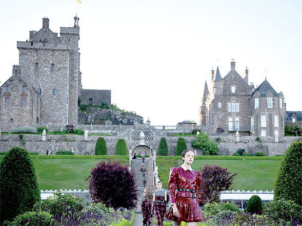 A model presents a creation for Dior during the 2025 Dior Croisiere (Cruise) fashion show on Monday at Drummond Castle, in Crieff, in Scotland (AFP photo)