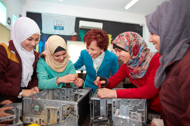 HRH Princess Basma interacts with students at the Social Support Centre in Amman on Tuesday (Petra photo)