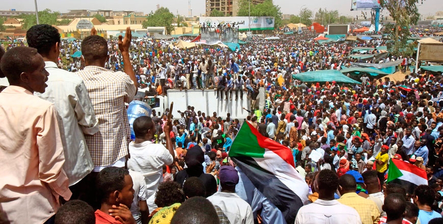 Sudanese demonstrators gather in a street in central Khartoum on Thursday, immediately after one of Africa's longest-serving presidents was toppled by the army (AFP photo)